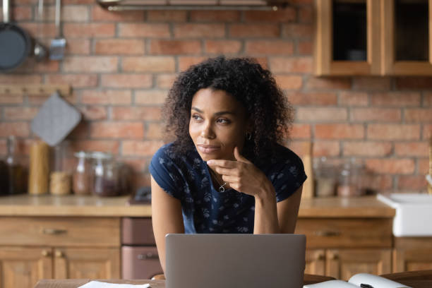 istock Happy ethnic lady lost in thoughts, vision concept. 1290259707