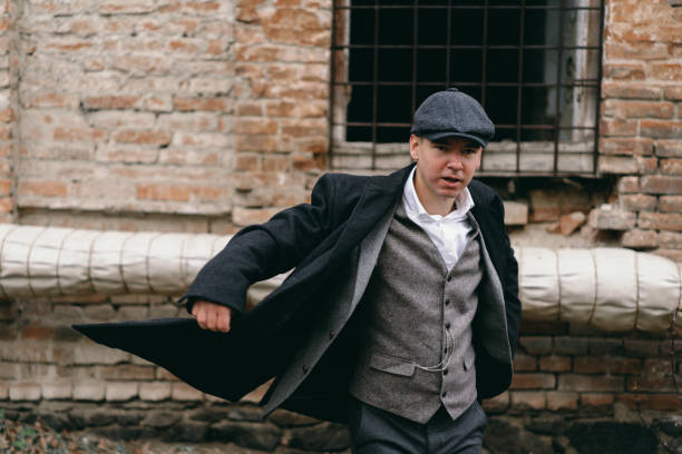 Portrait of a man in retro style. Peaky blinders. Vintage