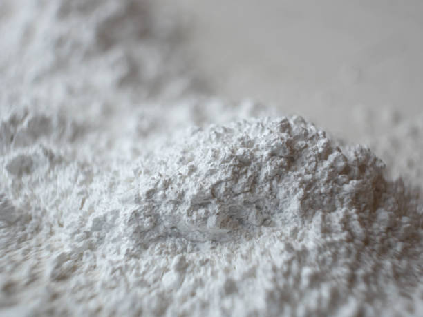 Calcium carbonate powder. Dusty component. Scatter calcium carbonate powder. Close up photo. carbonate mineral stock pictures, royalty-free photos & images