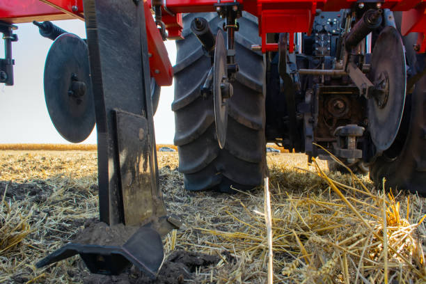 istock work of the trailed unit for tillage in the field 1290263555