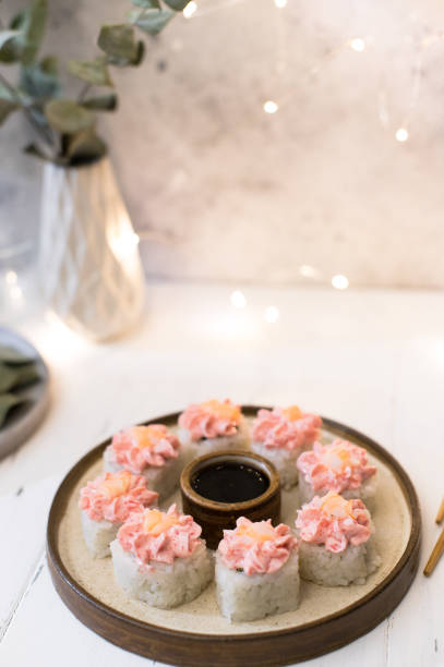 istock Sushi roll with pink cream, salmon 1290266822