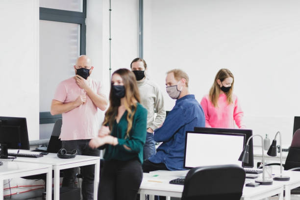 istock Office workers at meeting in office 1290269522