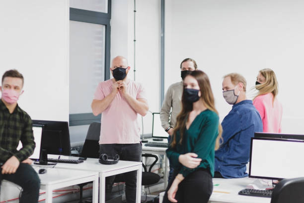 istock Office workers at meeting in office 1290269527