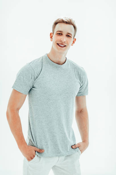 istock smiling guy in light casual clothes . isolated on white 1290273730
