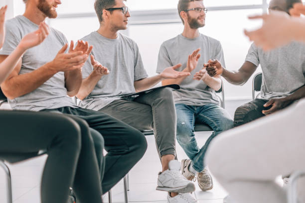 istock young man explaining something to his associates 1290273789