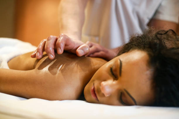 istock Young woman having a back massage 1290274797