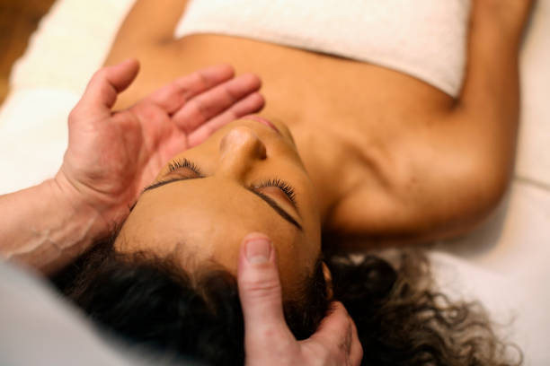 istock Young woman having a head massage 1290274987