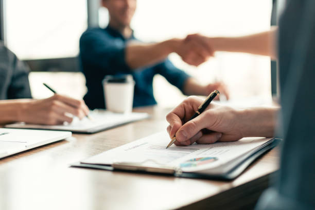 istock close up. business team is working on a new financial project 1290275214