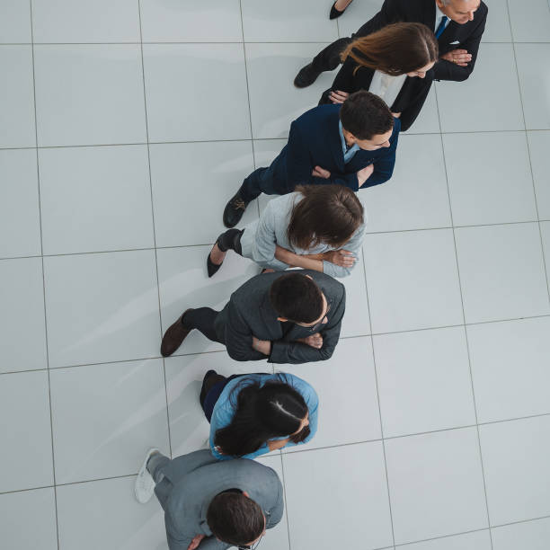 istock group of diverse business people standing in a queue 1290275398