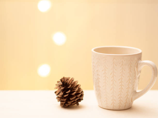 istock Cup of Coffee And Pine Cone 1290280426