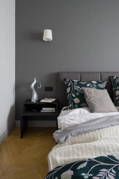 istock Elegant bedroom with gray wall 1290281683