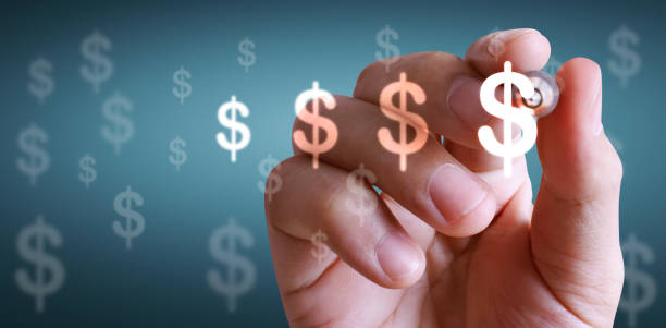 istock Close up Hand drawing Money icon 1290285524