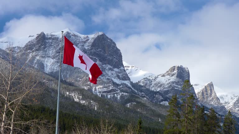 National Flag of Canada with natural mountains scenery