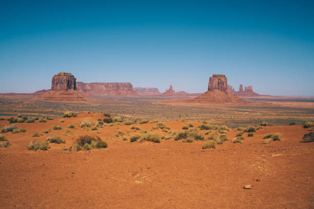 istock Dry hot desert with high mountains 1290299642