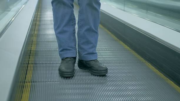 istock Barrier-free, iron escalator at the airport 1290303110
