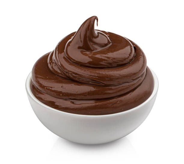 istock Bowl of chocolate cream isolated on white background 1290306419