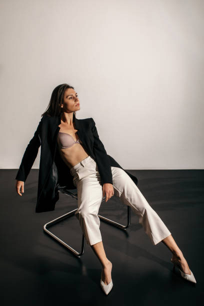 istock Fashion model posing in studio 1290308960
