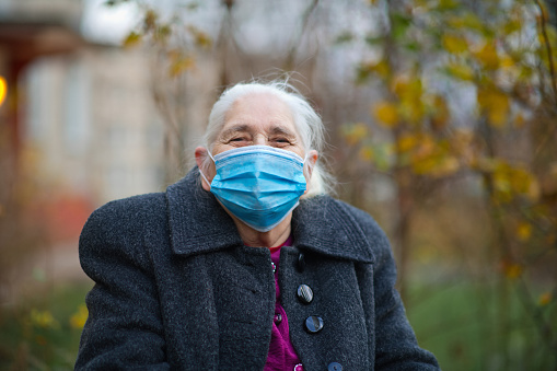 Senior woman in protective face mask