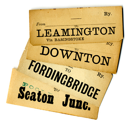 Four discoloured old 20th century British railway tickets: to Leamington (Warwickshire) via Basingstoke; to Downton (Wiltshire); to Fordingbridge (Hampshire); to Seaton Junction (Devon) via Poole (Dorset).