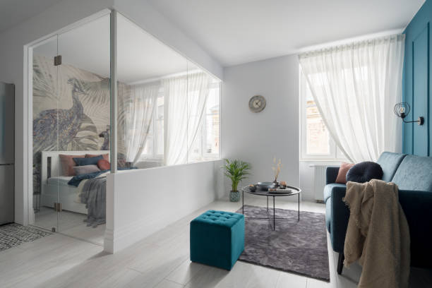 istock Glazed bedroom in elegant studio apartment 1290313551
