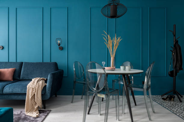 Small room with stylish blue wall