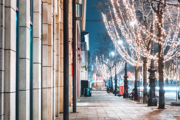 istock festive illuminated trees unter den Linden at blue hour in Berlin 1290314856