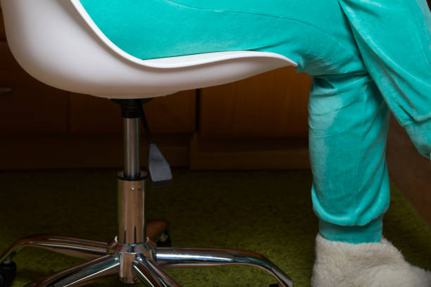 istock Woman Sitting in Office Chair 1290314960