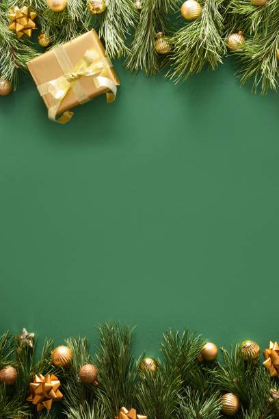 istock Christmas frame of golden gift and balls on blue. 1290315764