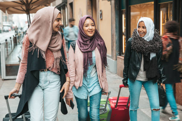 istock Three student friends arriving in the city 1290317659
