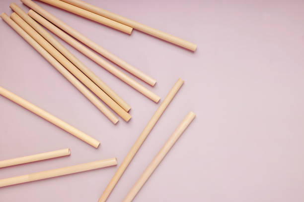 istock Reusable bamboo straws on the pink background, 1290320575