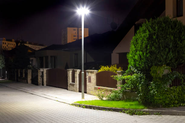 istock modern led illumination on quiet street at night 1290321776