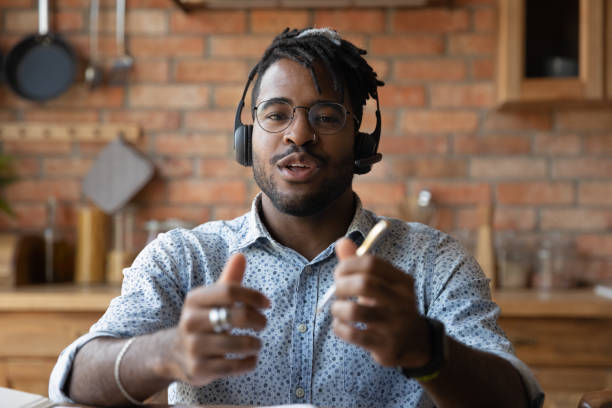 istock Screen view happy young african man holding video call conversation. 1290323417