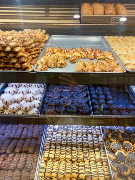 istock Various fresh pastries on display at a bakery shop 1290325780