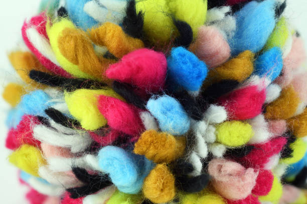istock Bright colorful multicolored background from knitted wool close-up. 1290326067