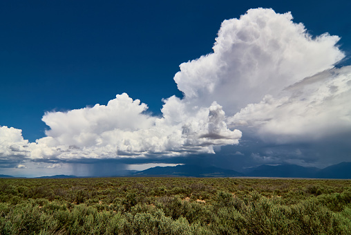 August thunderstorms building above the Sangre de Cristo mountains in northern New Mexico