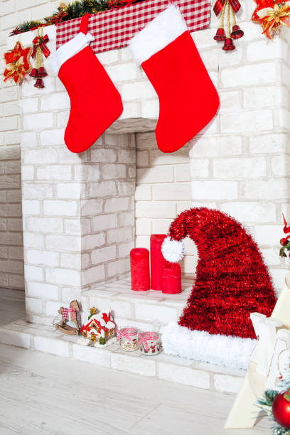 istock Decorative fireplace decorated with garlands and New Year's decor 1290327419