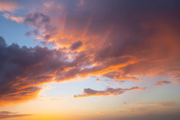 istock cirrus clouds at sunset over the sea 1290328692