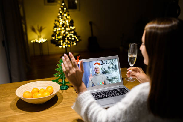 istock A girl has video call with a guy in santa hat 1290328822
