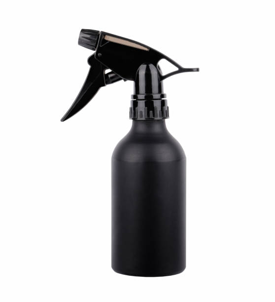 istock Plastic bottle for liquid spray, black color, close-up isolated on white background 1290329429