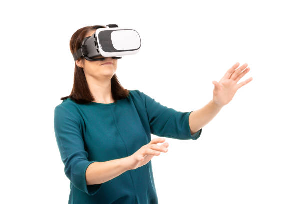 istock Young woman in virtual reality (VR) glasses. Isolated on white background 1290330164