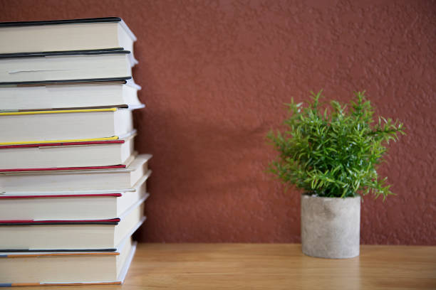 istock Textbooks on wooden desk. 1290330505