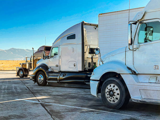 istock Three Semi Trucks Parked At A Rest Area In Utah, The Drivers Taking A Much Needed Break Before Heading For Their Destination 1290331253