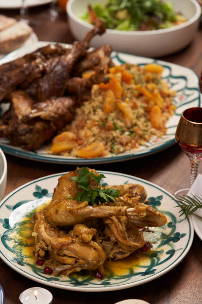 istock Christmas food table setting. Xmas and New Year dinner table 1290332777