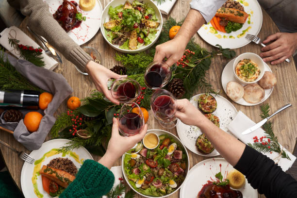 istock Christmas table with food, top view. Friends having dinner 1290332866