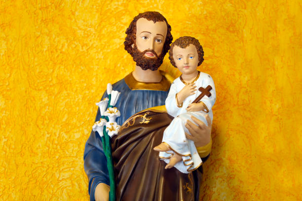 istock Saint Joseph and baby Jesus catholic image 1290333607