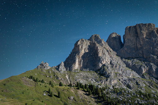 Italian mountains near the Langkofel Group in a cloudless night, full of stars.