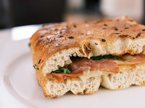 Savory Focaccia lunch close-up on blurred kitchen backgrounds