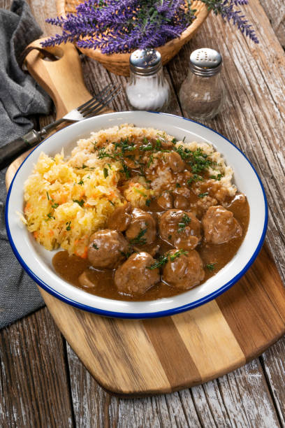 istock Minced meat balls in mushroom sauce. 1290337250