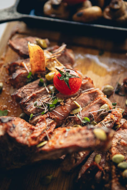 istock Ribeye steak on a wooden board 1290337418