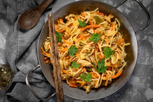 istock Fried noodles with chicken and vegetables. 1290337438